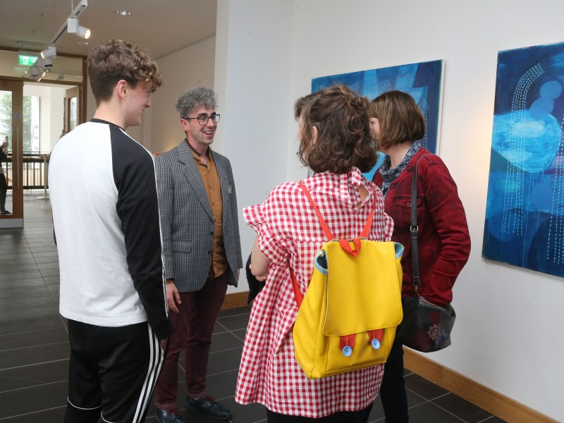 Artist Shane Finan speaks with visitors at the Over Nature exhibition at Roe Valley Arts and Cultural Centre in Limavady.