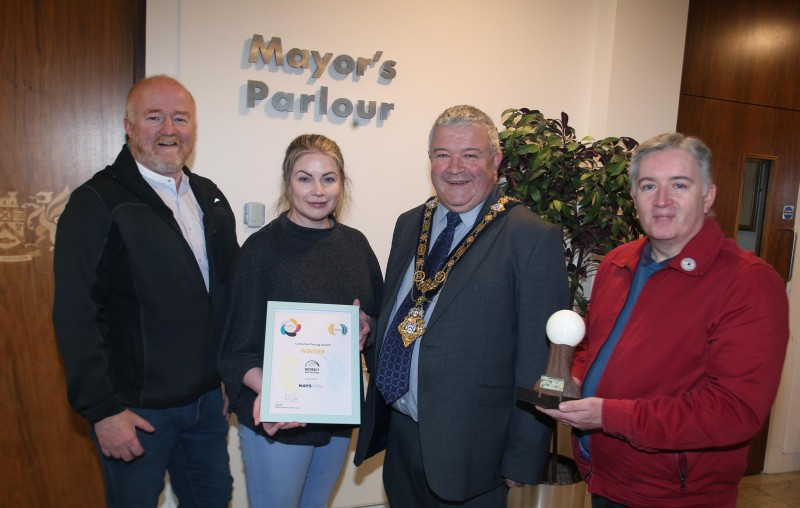 Eoin McConnell, Shauna McFall and Richard Phelan from Naturally North Coast and Glens Artisan Market, winners of the Consumer Facing category t the Social Enterprise NI Awards, pictured in Cloonavin with the Mayor of Causeway Coast and Glens Borough Council, Councillor Ivor Wallace.