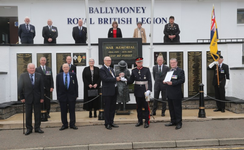 John Pinkerton and the Lord-Lieutenant for County Antrim Mr David McCorkell pictured at Ballymoney War Memorial with representatives of Ballymoney Royal British Legion where a special presentation took place in recognition of the Queen’s Award for Voluntary Service.