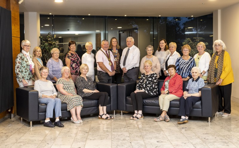 Members of the Ballymoney WI who recently enjoyed a visit to Cloonavin, pictured with the Mayor of Causeway Coast and Glens Borough Council, Councillor Ivor Wallace and Councillor Alan McLean.