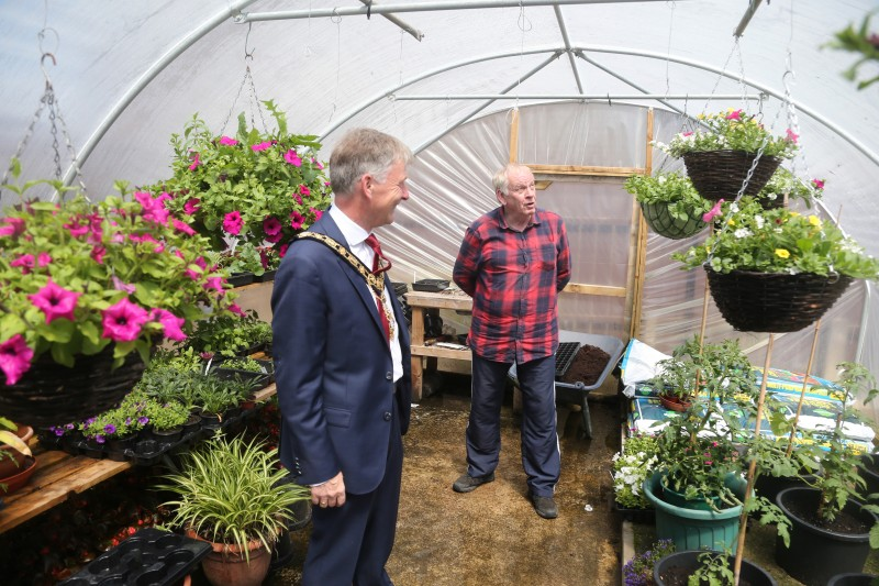 Adrian Eakin pictured with the Mayor of Causeway Coast and Glens Borough Council Alderman Mark Fielding during his visit to Ballysally to view progress on Project Girona, a green energy pilot scheme.