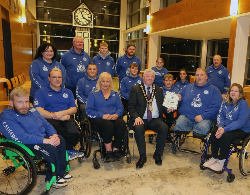 Causeway Giants Wheelchair Basketball team and club members pictured alongside the Mayor of Causeway Coast and Glens, Councillor Steven Callaghan, at a recent reception in Civic Headquarters Cloonavin.