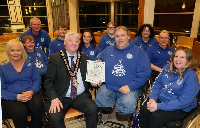 Members of Causeway Giants Wheelchair Basketball team, pictured at Cloonavin at a recent Mayoral reception (l-r back row) Ethan Pollock, Michael Sweeney, Daniel Black, Natalie Kinney (Team Vice Captain), Youngest Club Member Sarah Logan, Niamh Galway, George Wallace (Team Coach); (l-r front row) Lisa Boyle, The Mayor, Councillor Steven Callaghan, Stephen Heron (Club Chairman) and Helen Logan (Club Secretary