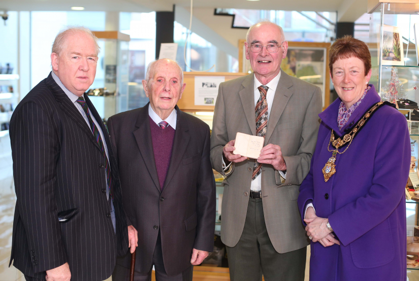 The Mayor of Causeway Coast and Glens Borough Council, Councillor Joan Baird OBE, pictured at Ballymoney Museum with Edwin RL Chambers’ son Laurence, grandson Steven and Ernest Crawford who re-discovered the bible in the 1940s.