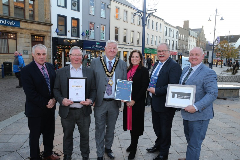 The Mayor congratulates Coleraine BID on a successful year, pictured with Julienne Elliott, Council’s Town and Village Manager, Maurice Bradley MLA and BID Board members Declan O'Malley, Ian Donaghey MBE (Chair), Jamie Hamill.