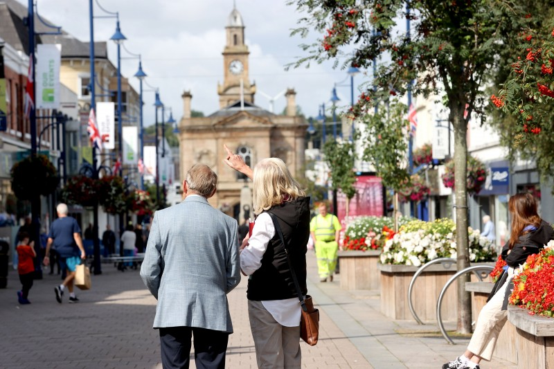 Britain in Bloom judge Rae Beckwith is given an overview of Coleraine’s town centre initiatives by Jan O'Neill, Council’s Physical Regeneration Project Officer.
