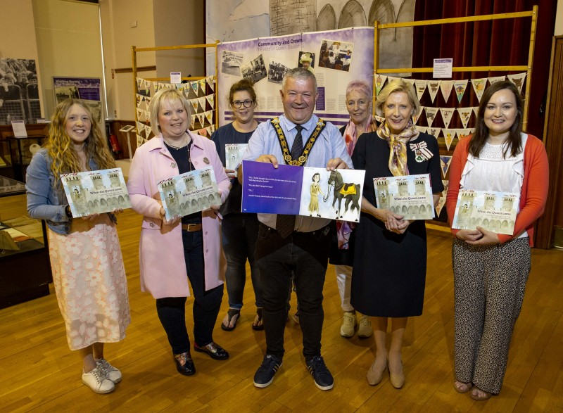 Pictured at the official launch of the children’s storybook ‘When the Queen Came’ are Museums Officer Jamie Austin, Alderman Michelle Knight McQuillan (Chair of Council’s Jubilee Working Group), Museum Services Development Manager Sarah Carson, the Mayor of Causeway Coast and Glens Borough Council Councillor Ivor Wallace, Museum Services Officer Joanne Honeyford, Lord Lieutenant of County Londonderry Mrs Alison Millar, and Museum Services Officer Rachel Archibald.