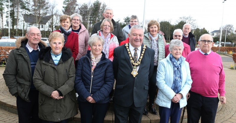 The Mayor of Causeway Coast and Glens Borough Council, Councillor Ivor Wallace, pictured at Cloonavin with members of Boveedy Springwell Club.