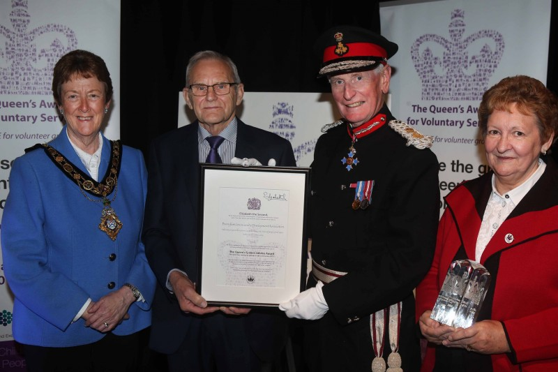 Burnfoot Community Association members Kathleen Douglas and Lyle Quigley with their Queen's Award for Voluntary Service certificate and crystal along with the Mayor of Causeway Coast and Glens Borough Council, Councillor Joan Baird OBE, and the Lord Lieutenant for County Londonderry, Denis Desmond CBE.
