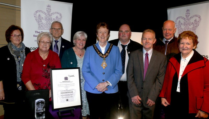 Members of Burnfoot Community Association pictured at an event to mark their receipt of the Queen's Award for Voluntary Service the Mayor of Causeway Coast and Glens Borough Council Councillor Joan Baird OBE.