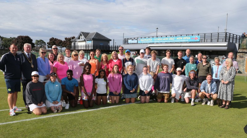 Mayor of Causeway Coast and Glens, Councillor Steven Callaghan and Deputy Mayor, Councillor Margaret-Anne McKillop, pictured alongside participants, family members and friends who attended the Senior Tennis Tournament in Ballycastle.
