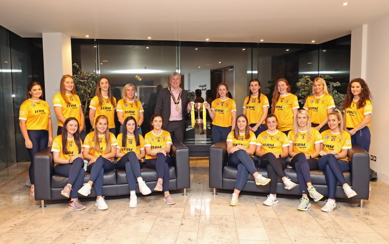 Pictured with the Mayor of Causeway Coast and Glens Borough Council, Councillor Richard Holmes, at a reception in Cloonavin are members of the successful Intermediate Antrim Camogie team.