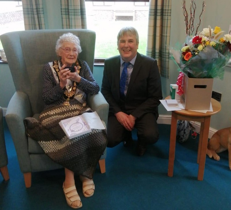 Mrs Moira Campbell pictured on her 100th birthday with the Mayor of Causeway Coast and Glens Borough Council, Councillor Richard Holmes.