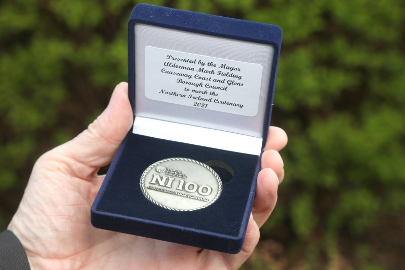 The commemorative centenary coin designed by Causeway Coast and Glens Borough Council as part of its NI 100 programme of events.
