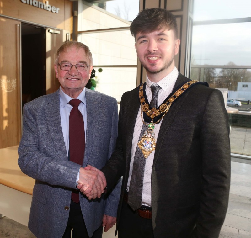 The Mayor of Causeway Coast and Glens Borough Council Councillor Sean Bateson offers his best wishes to William Callaghan who celebrated his 80th birthday on the day of the reception held in Cloonavin for Castlerock Wednesday Club.