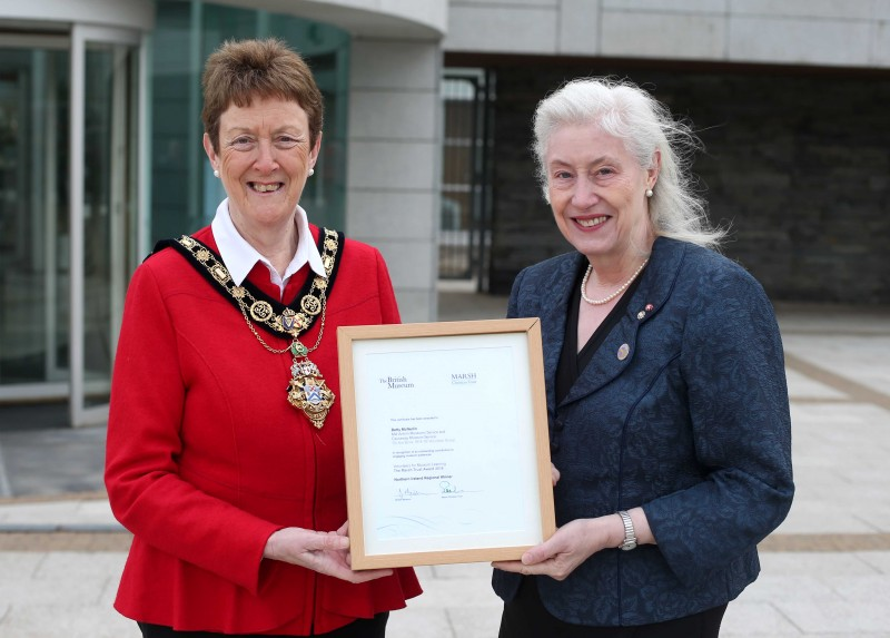 The Mayor of Causeway Coast and Glens Borough Council Councillor Joan Baird OBE presents Betty McNerlin with her Marsh award certificate from the British Museum.