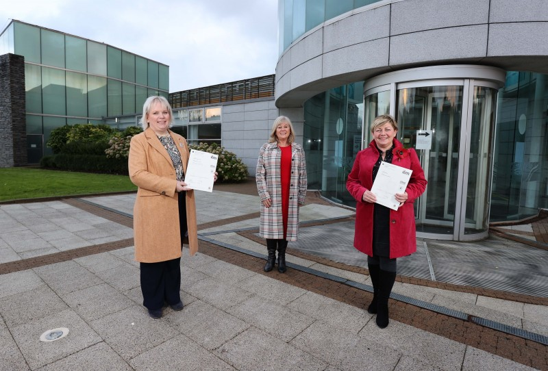 Alderman Michelle Knight McQuillan and Alderman Sharon McKillop pictured with their certificates and consultant Dorothy McKee.