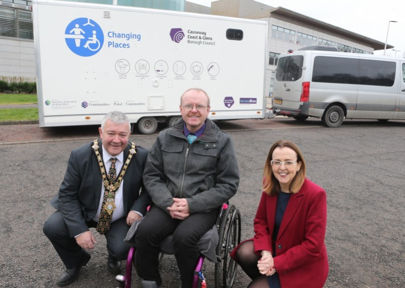 The Mayor of Causeway Coast and Glens Borough Council, Councillor Ivor Wallace, and Council’s Diversity Champion, Councillor Cara McShane along with AccessoLoo Director Michael Holden. The new Mobile Accessible Changing Units will be managed by AccessoLoo on Council’s behalf.