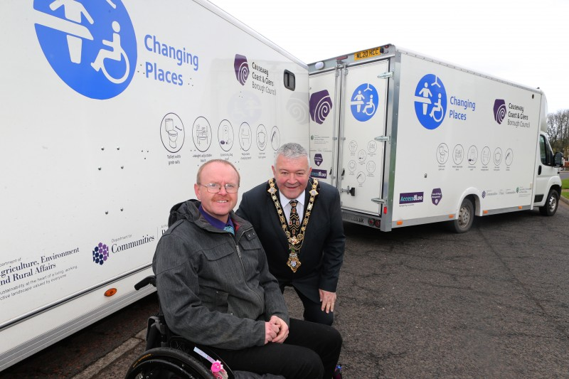 The Mayor of Causeway Coast and Glens Borough Council, Councillor Ivor Wallace, pictured with Michael Holden, AccessoLoo Director. The new Mobile Accessible Changing Units will be managed by AccessoLoo on Council’s behalf.