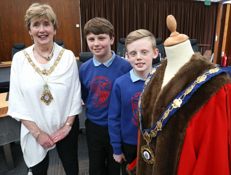 Issac Dunn and Finn McCotter from Garryduff Primary School pictured with the Mayor of Causeway Coast and Glens Borough Council, Alderman Maura Hickey.