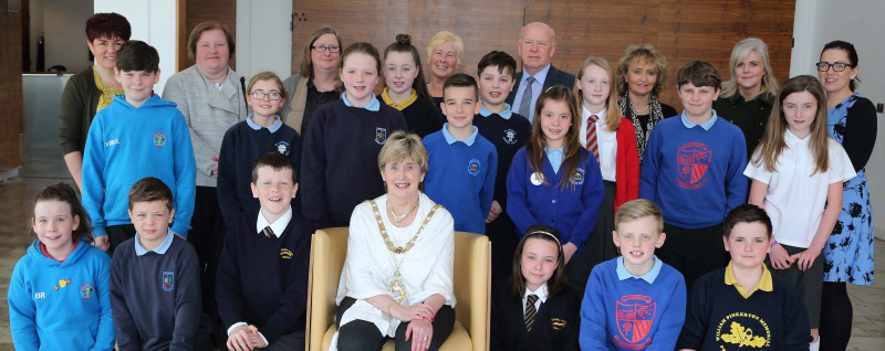 Pupils and teachers from local primary schools pictured during a visit to Cloonavin with the Mayor of Causeway Coast and Glens Borough Council, Alderman Maura Hickey.