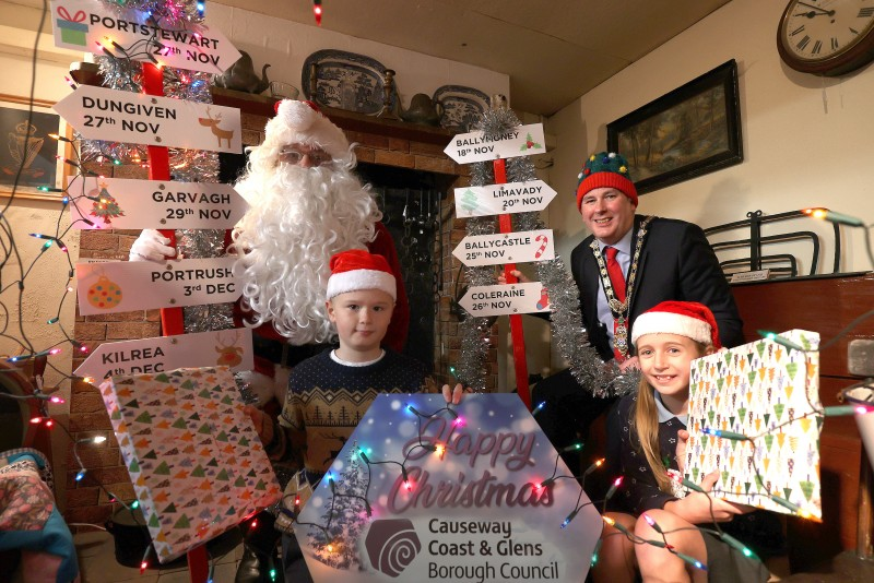 The Mayor of Causeway Coast and Glens Borough Council Councillor Richard Holmes joins Santa Claus and Garvagh Primary School pupils Reuben Catherwood and Siri McFetridge in Garvagh Museum ahead of the Christmas Cavalcade which will visit nine towns in the Borough during November and December.