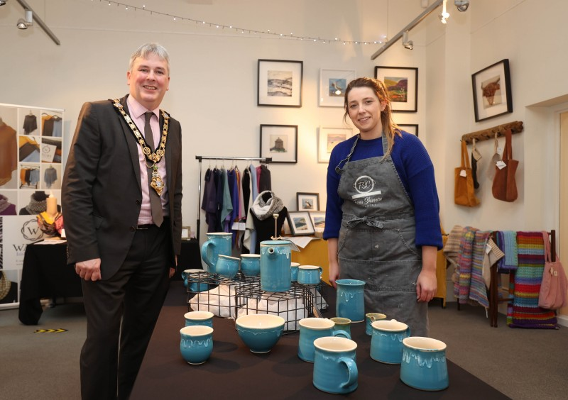 The Mayor of Causeway Coast and Glens Borough Council, Councillor Richard Holmes pictured with ceramic artist Fiona Shannon at Flowerfield Arts Centre’s popular Christmas Craft Market.