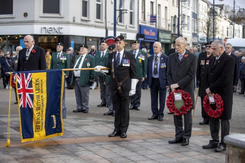 11 The Standard is lowered during the Armistice Day service held at the War Memorial in Coleraine on Thursday 11th November 2021.