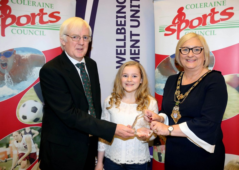 Caitlin Henry, winner of the Junior Sports Woman title at Coleraine Sports Awards receives her award from the Mayor of Causeway Coast and Glens Borough Council Councillor Brenda Chivers and Robert McVeigh from Northern Ireland Commonwealth Games Council. Caitlin has enjoyed a raft of success in judo including gold medals at the 2018 Irish Open and Irish Schools competition.