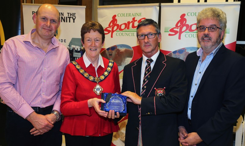 The Junior Sportswoman award is collected by Geoff Bones, Bann Rowing Club on behalf of winner Hannah Scott for her rowing achievements this year from the Mayor of Causeway Coast and Glens Borough Council Councillor Joan Baird OBE. Also pictured is Grant Cameron, BBC Sport Northern Ireland and Hannah’s father Mal Scott.