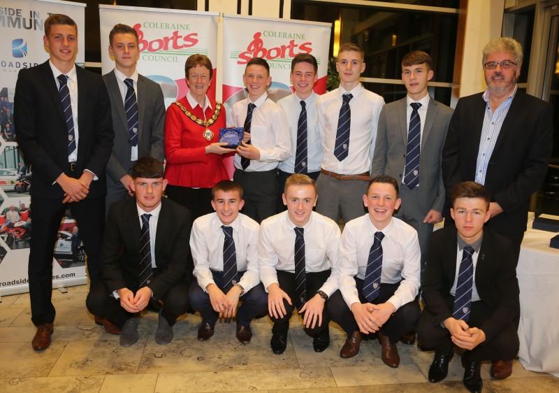 Members of the Coleraine FC Academy Under 16 squad collect their award for Junior Team from the Mayor of Causeway Coast and Glens Borough Council Councillor Joan Baird OBE and Grant Cameron, BBC Sport Northern Ireland.
