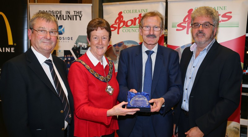 Winner of the Services to Sport award Victor Leonard accepts his award from the Mayor of Causeway Coast and Glens Borough Council Councillor Joan Baird OBE, Grant Cameron, BBC Sport Northern Ireland and Hugh Wade, Chairman of Coleraine Sports Council.