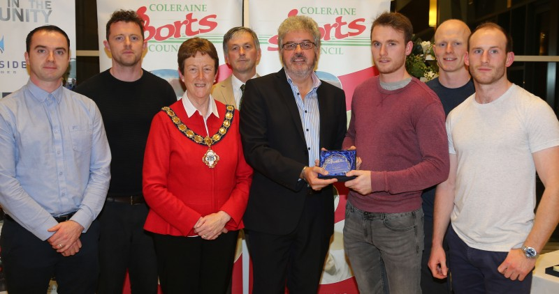 Members of Eoghan Rua GAC, Coleraine, receive their award for Senior Team of the Year from the Mayor of Causeway Coast and Glens Borough Council Councillor Joan Baird OBE and Grant Cameron, BBC Sport Northern Ireland.