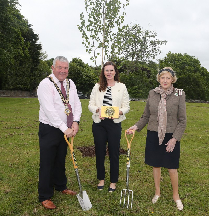 The Mayor of Causeway Coast and Glens Borough Council, Councillor Ivor Wallace, alongside Deputy Lord Lieutenant for Co Londonderry, Leona Kane and Lord Lieutenant for Co Londonderry Alison Millar - the newly planted tree, has been placed in the grounds of Cloonavin next to the Platinum Jubilee tree.
