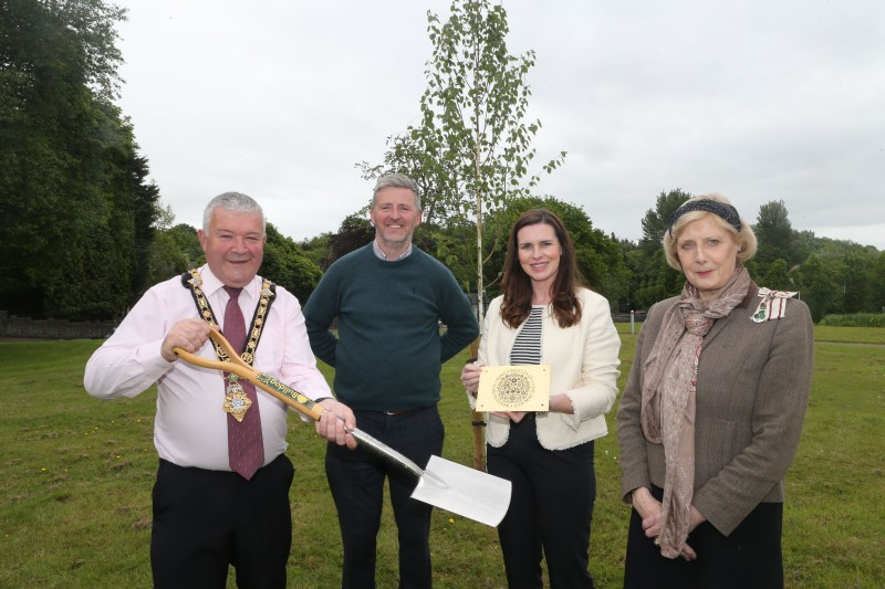 The Mayor of Causeway Coast and Glens Borough Council, Councillor Ivor Wallace alongside Noel Davoren from Councils estates team, Lord Lieutenant for Co Londonderry Alison Millar and Deputy Lord Lieutenant for Co Londonderry, Leona Kane as the new Coronation Tree is planted in the grounds of Cloonavin.