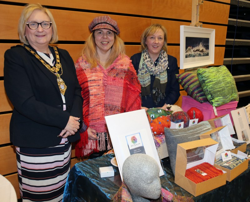 The Mayor of Causeway Coast and Glens Borough Council, Councillor Brenda Chivers pictured with representatives from the Makers House at the Designerie at the ‘Crafters Showcase’ at Flowerfield Arts Centre.