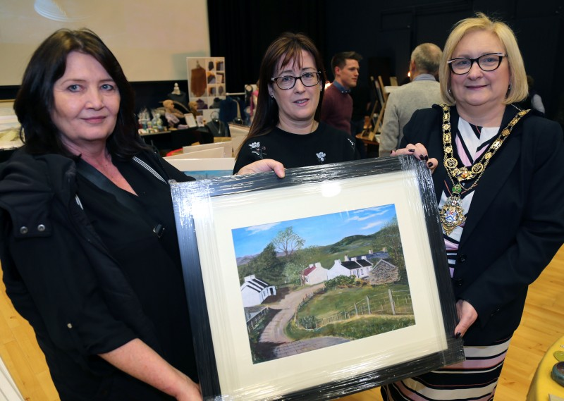 . The Mayor of Causeway Coast and Glens Borough Council, Councillor Brenda Chivers pictured with Bridgeen Butler and Catrina Mc Neill, Project Officer, Town & Village Management, Causeway Coast and Glens Borough Council at the ‘Crafters Showcase’ at Flowerfield Arts Centre