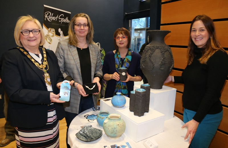 The Mayor of Causeway Coast and Glens Borough Council, Councillor Brenda Chivers pictured with Zoe Bratton, Tourism Product Development Officer, Causeway Coast and Glens Borough Council at the ‘Crafters Showcase’ at Flowerfield Arts Centre with representatives from VM Jewellery and Elements Studio.
