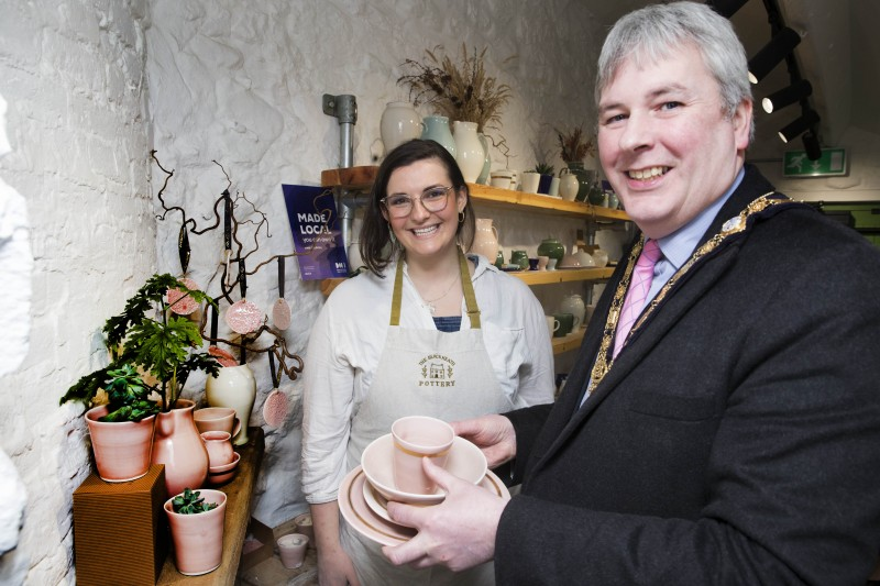 The Mayor of Causeway Coast and Glens Borough Council Councillor Richard Holmes pictured with Babs Belshaw at The Blackheath Pottery, one of the participants in the new Causeway Craft Trail.