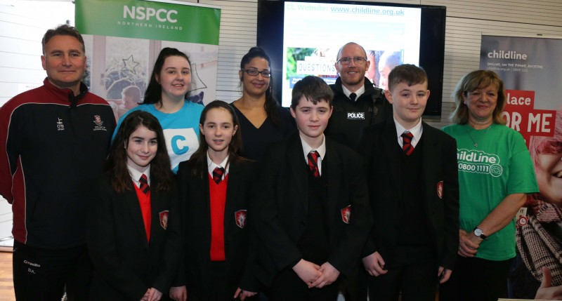 Teacher Mr Kirgan pictured with pupils from Our Lady of Lourdes School in Ballymoney, Irene McCready (NSPCC), Ineke Houtenbos (NSPCC) and Roisin Moody from Childline at the  ‘Don’t Worry Be #appy’ Internet Resilience and Safety’ conference organised by Causeway Coast and Glens Policing and Community Safety Partnership.