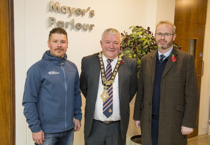 Philip Mullan pictured with the Mayor of Causeway Coast and Glens Borough Council, Councillor Ivor Wallace and Councillor James Mc Corkell