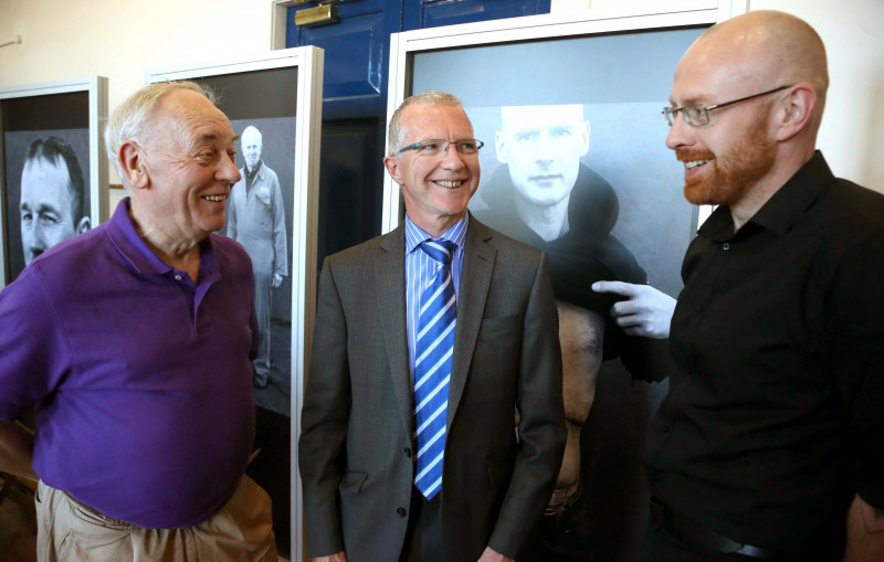 Mac Pollock, Bryan Edgar and Councillor Darryl Wilson pictured at the opening of the BBC Northern Ireland Road Racing People exhibition in Ballymoney Town Hall.