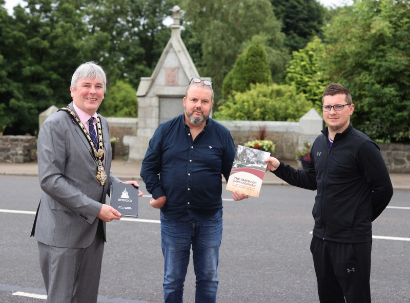 The Mayor of Causeway Coast and Glens Borough Council Councillor Richard Holmes pictured during his recent visit to Dervock with Frankie Cunningham - Chair of Dervock & District Community Association and Matthew Hagan, chef/proprietor of The Pepper Mill café and Chairperson of Dervock Young Defenders Flute Band.