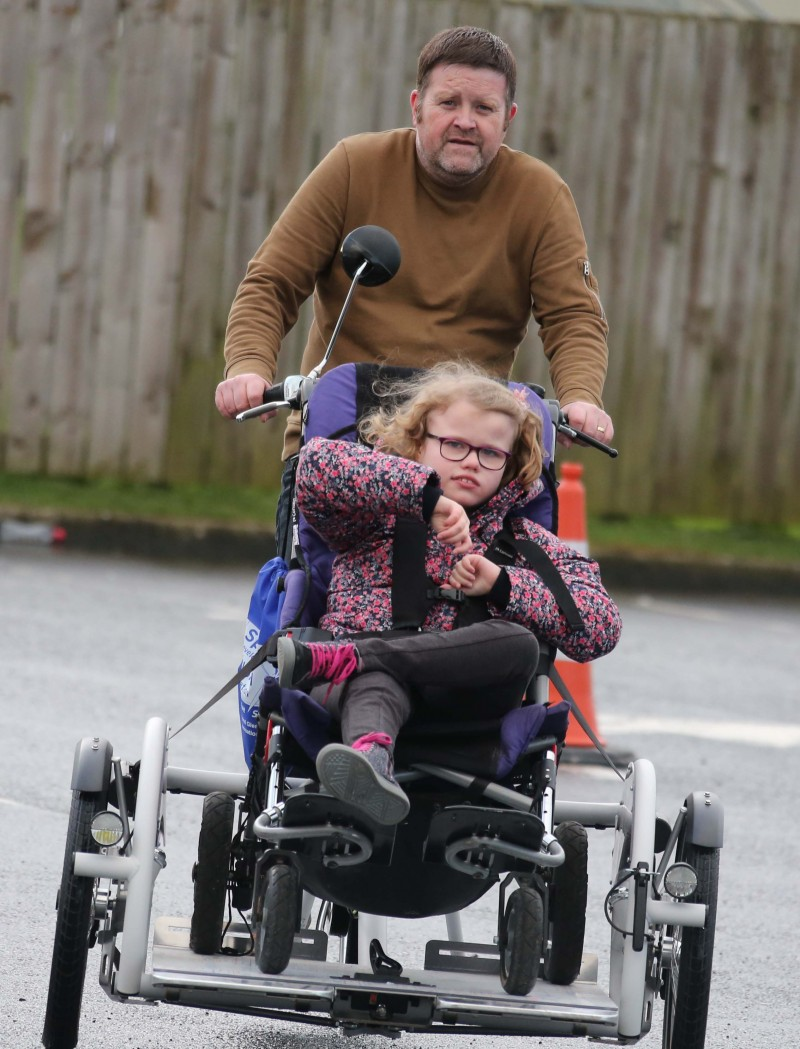 Lilia Mc Clements and her father Gregg from Aghadowey enjoy the Inclusive Cycling event organised by Causeway Coast and Glens Borough Council.