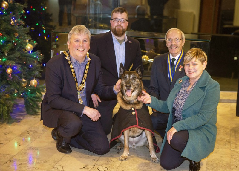 Retired military dog Zadar pictured with his owner during his visit to Cloonavin where he was welcomed by the Mayor of Causeway Coast and Glens Borough Council Councillor Richard Holmes, Council’s Veterans’ Champion Alderman Sharon McKillop and Bill Mills from Coleraine Royal British Legion.