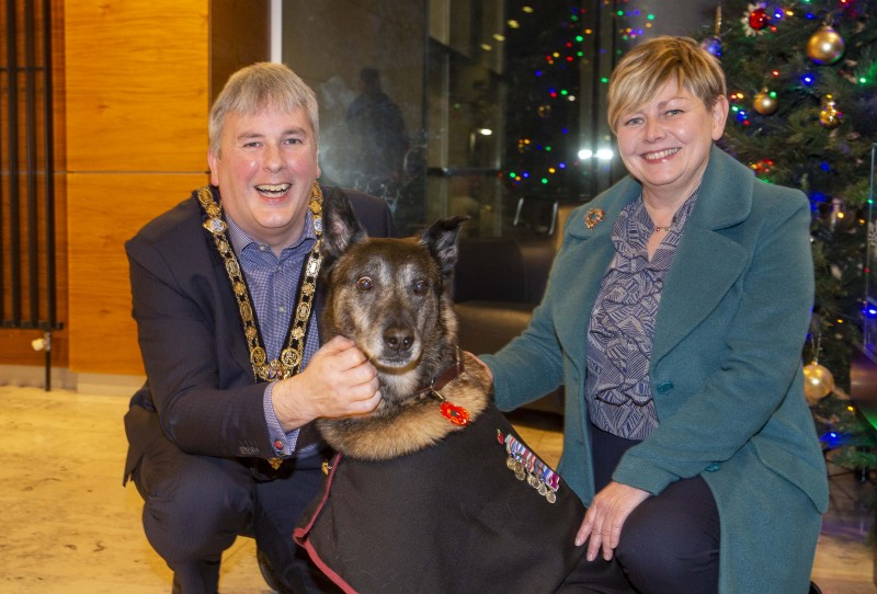 Retired military dog Zadar pictured with the Mayor of Causeway Coast and Glens Borough Council Councillor Richard Holmes and Council’s Veterans’ Champion Alderman Sharon McKillop during his visit to Cloonavin.