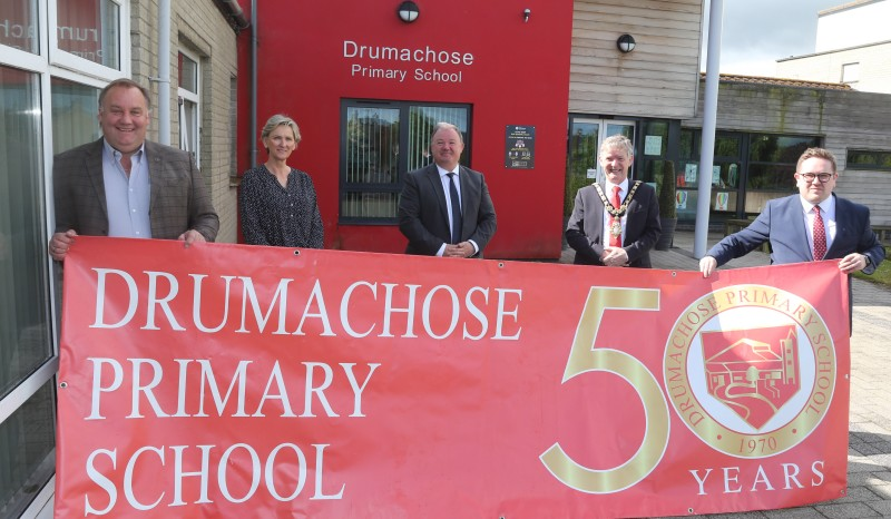 The Mayor of Causeway Coast and Glens Borough Council Alderman Mark Fielding pictured at Drumachose Primary School to mark its 50th anniversary with Marshall Kilgore (Principal), Roy Nutt (Chairman of PTA), Pamela McLean (Chair of the Board of Governors) and past pupil Councillor Aaron Callan.