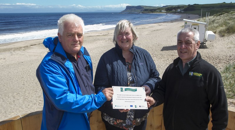 Pictured at the completion of the Coastal and Dune Management project at Ballycastle Beach is Gareth Evans, Rural Development Programme Manager, DAERA, Councillor Sandra Hunter, Causeway Coast and Glens Borough Council and Nigel Mc Fadden, Rural Development Project Claims & Monitoring Officer, Causeway Coast and Glens Borough Council.
