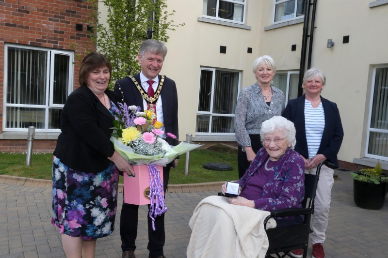 The Mayor of Causeway Coast and Glens Borough Council Alderman Mark Fielding and the Mayoress Mrs Phyliss Fielding present Edith Gilmore from Aghadowey with her centenary coin. Also pictured are Edith’s daughters Mary Platt and Alison Cromie. Edith celebrated her 100th birthday on April 16th 2021.