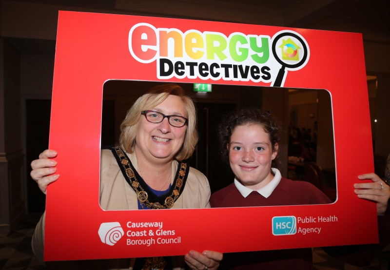 The Mayor of Causeway Coast and Glens Borough Council Councillor Brenda Chivers shows her support for the Energy Detectives programme with a pupil from St Mary’s Primary School in Cushendall.